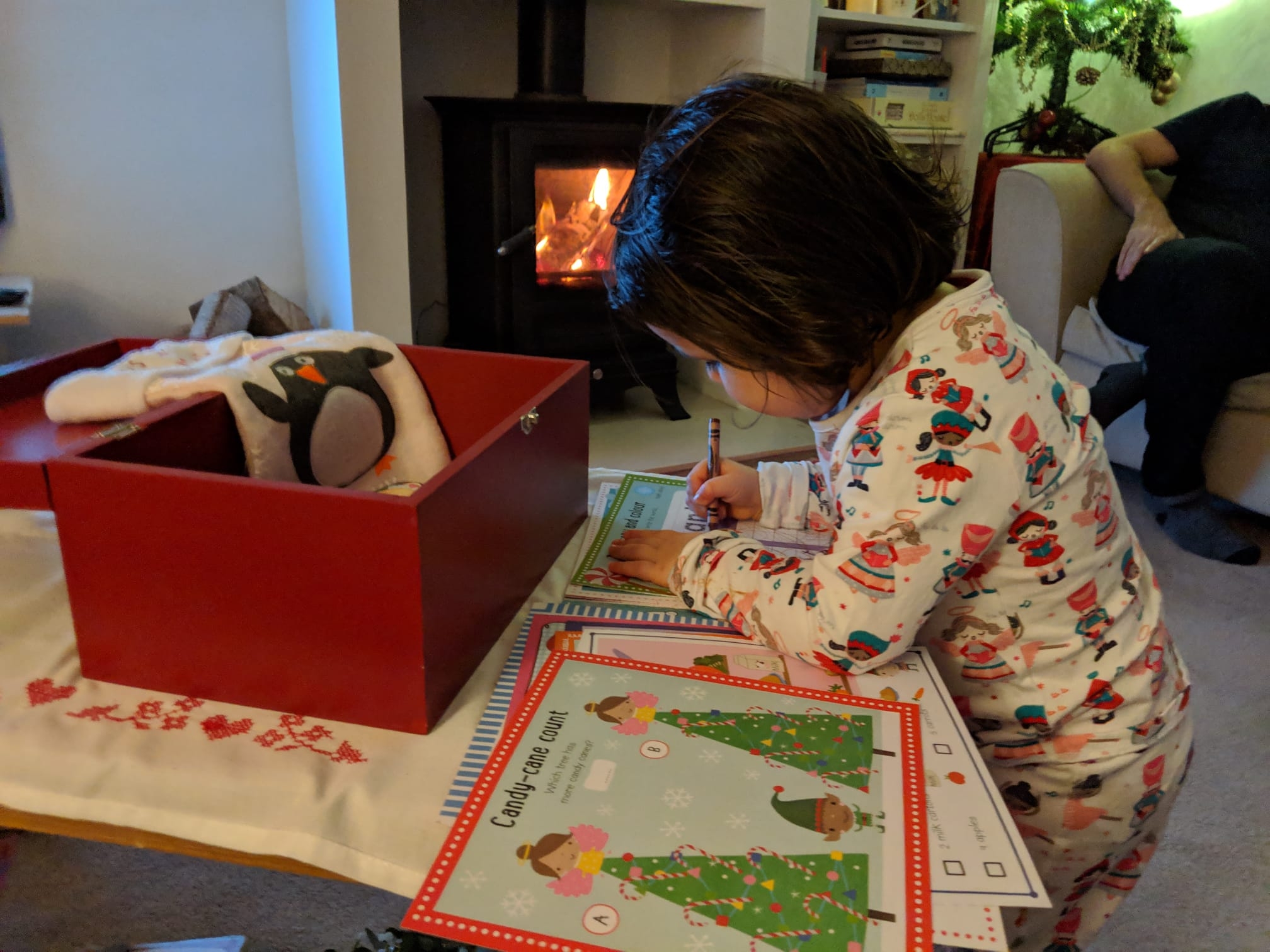 Image of child with Christmas Eve box